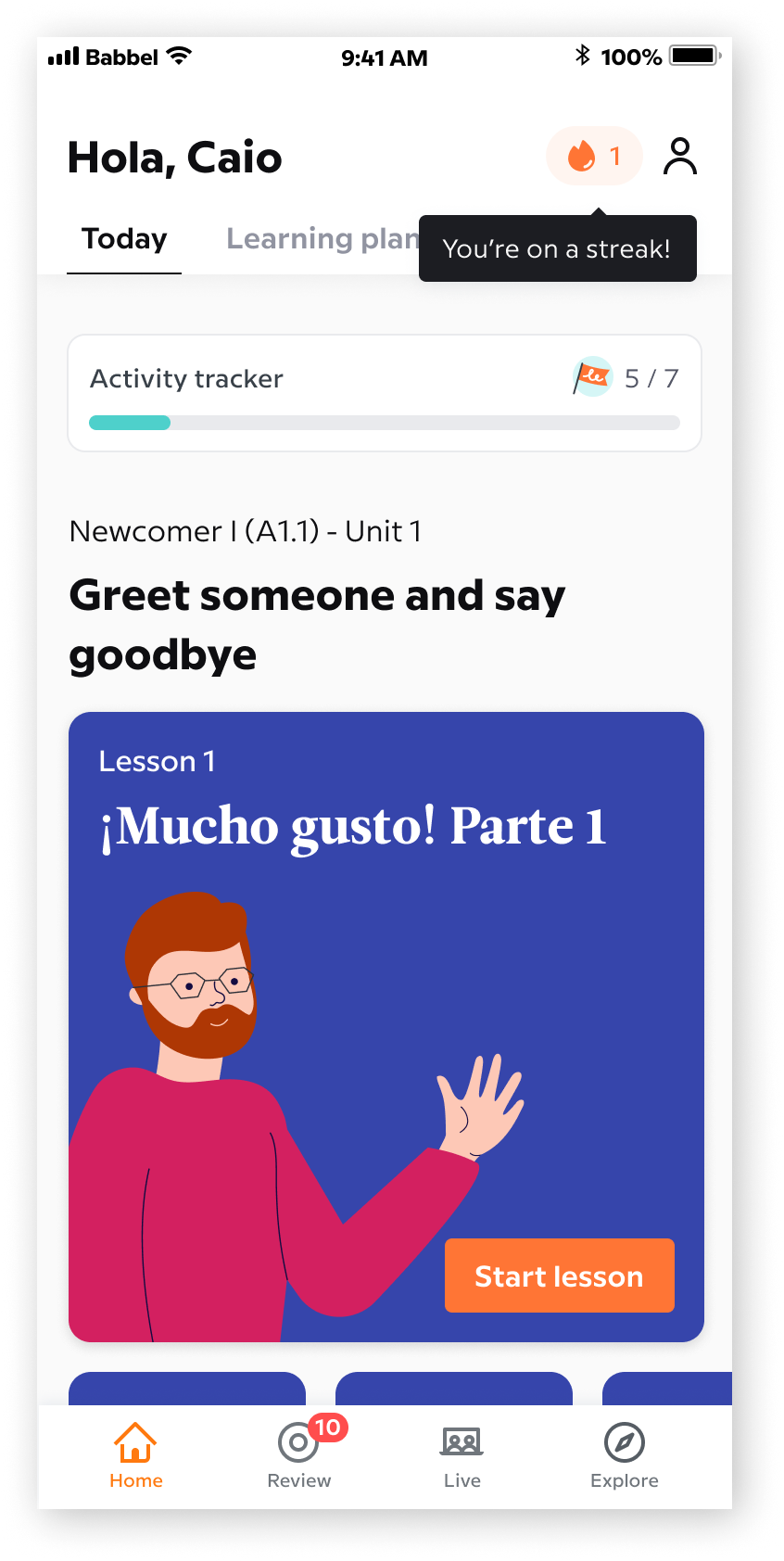 Mobile home screen with the streak icon and its onboarding tooltip